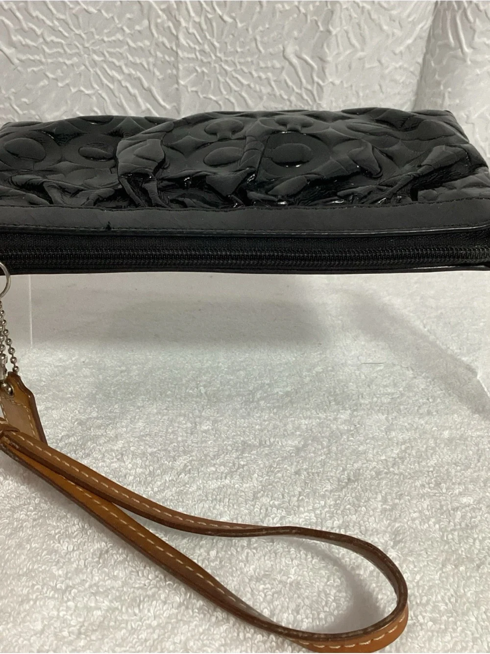 COACH Black Signature Embossed C Patent Leather Bag with Charm & Wrist Strap